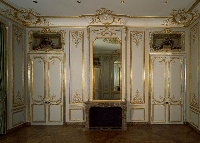Paneled Room:Wall with doors and fireplace
