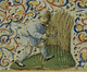 Farmer cutting wheat in border