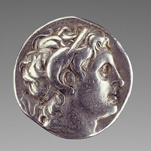 <em>Coin with Alexander the Great with the Horn of Zeus Ammon</em>, Greek, minted at Pella, 286-281 BC, silver. The J. Paul Getty Museum. Gift of Lily Tomlin
