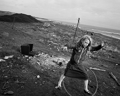 Helen and Her Hula-hoop, Seacoal Camp, Lynemouth, Northumberland, 1984, Chris Killip, gelatin silver print.  The J. Paul Getty Museum, purchased in part with funds provided by Alison Bryan Crowell, Trish and Jan de Bont, Daniel Greenberg and Susan Steinhauser, Manfred Heiting, Gloria Katz and Willar