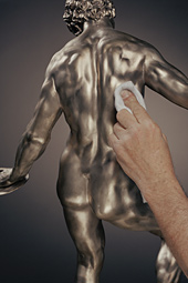 Polishing the cast sculpture