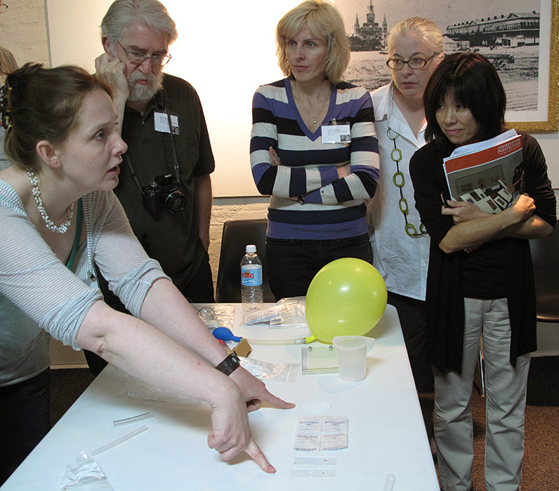 demonstrating water surface tension