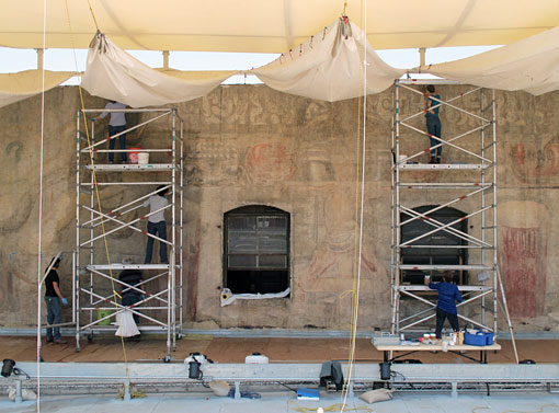 conservators doing surface cleaning