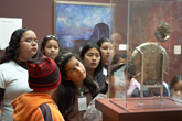 Students contemplate a decorative plate during a Self-Guided Visit at the Getty Center.