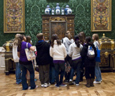 Elementary students on a school visit contmeplate decorative arts at Getty Center.