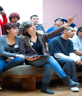 High school students discussing art during their self-guided visit to the Getty Center.