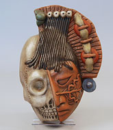 Cycle of life mask inspired by Aztec art