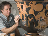 Conservator Jeff Maish completes work on a large mixing vessel at the Getty Villa