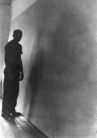 Jackson Pollock with the canvas for his mural
