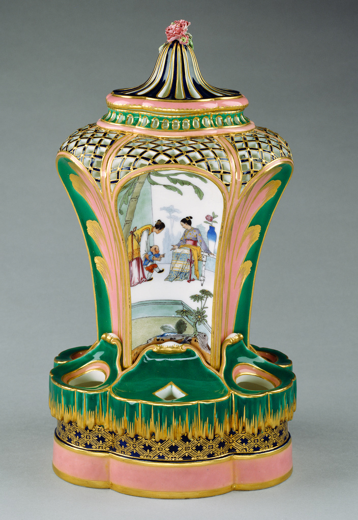 Pair of Vases (pots-pourris fontaine or pots-pourri à dauphins); Painted decoration attributed to Charles-Nicolas Dodin (French, 1734 - 1803), Sèvres Manufactory (French, 1756 - present); about 1760; Soft paste porcelain; bleu lapis, blue, pink and green ground colors, polychrome enamel decoration, and gilding; 78.DE.358 No description of this image is available.