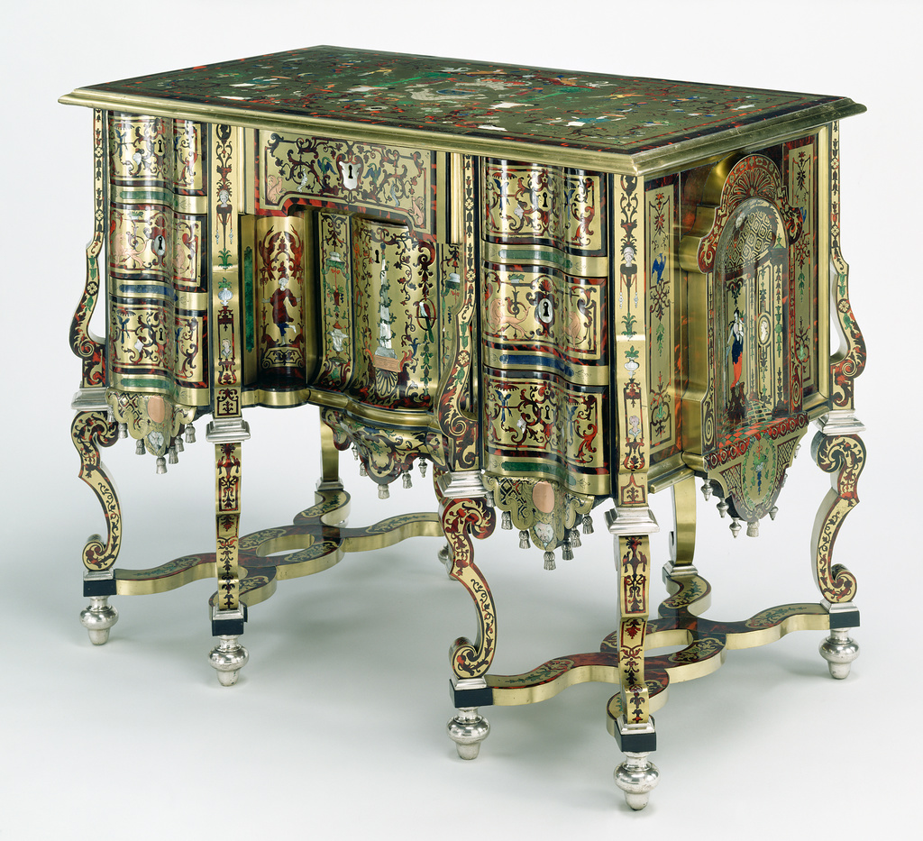 Desk (bureau "Mazarin"); Unknown; Paris, France; about 1692 - 1700; Fir, veneered with brass, copper, silver, ebony, bone, horn (some painted blue, green, orange and red and laid on gold foil), mother-of-pearl, and tortoiseshell; drawers of beech, oak, walnut; silvered-bronze mount; silk velvet; steel key; 70.5 × 88.9 × 50.8 cm (27 3/4 × 35 × 20 in.); 87.DA.77 No description of this image is available.