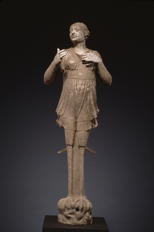 Statue of a Standing Siren; Unknown; Tarentum (Taras), South Italy; 330–300 B.C.; Terracotta with white slip and polychromy (red); 140 × 48 × 68 cm (55 1/8 × 18 7/8 × 26 3/4 in.); 76.AD.11.3 No description of this image is available.