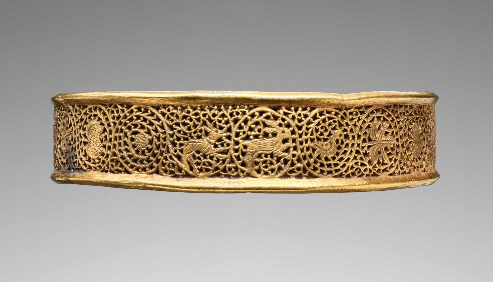 Bracelet; Unknown; about A.D. 379–395; Gold; 1.4 × 6.3 cm (9/16 × 2 1/2 in.); 83.AM.227.3; Rights Statement: No Copyright - United States Bracelet; Unknown; about A.D. 379–395; Gold; 1.4 × 6.3 cm (9/16 × 2 1/2 in.); 83.AM.227.3; Rights Statement: No Copyright - United States