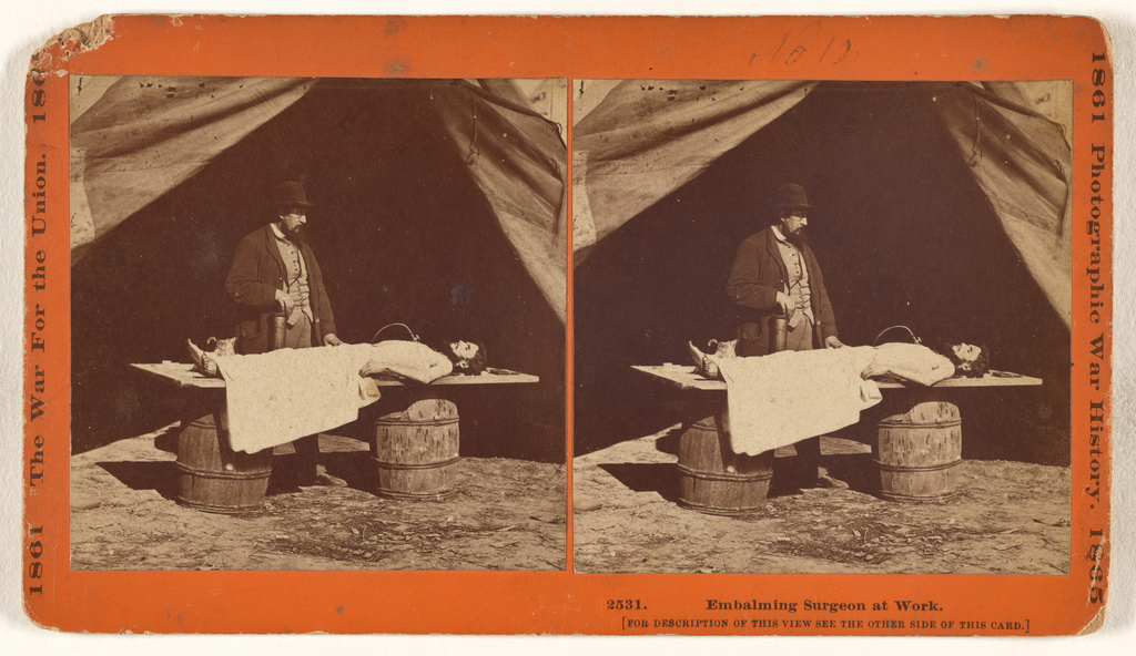 Embalming Surgeon at Work. This view shows Dr. Burr, the embalming