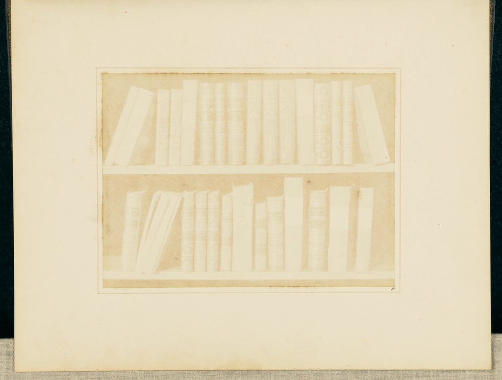 A Scene in a Library; William Henry Fox Talbot (English, 1800 - 1877); Reading, England, Europe; 1844; Salted paper print; 13.1 × 17.8 cm (5 3/16 × 7 in.); 84.XZ.572.8 No description of this image is available.