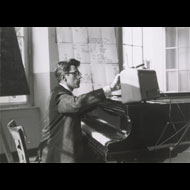 Unknown / David Tudor performing John Cage's Water Music in Darmstadt