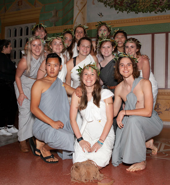 Group of college students wearing togas