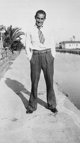 Man Standing on Sidewalk / Unknown