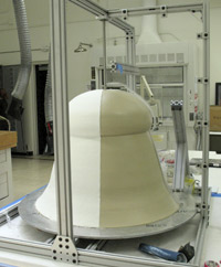 facsimile clay and plaster form of the krater on a turntable in the Antiquities Conservation studios at the Getty Villa