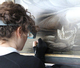 Getty conservator Laura Rivers at work on Ecce Homo / Heemskerck