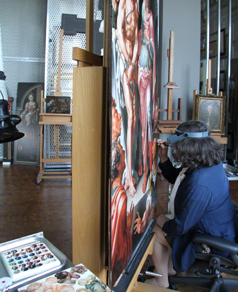 Getty paintings conservator Yvonne Szafran working on Ecce Homo / Heemskerck