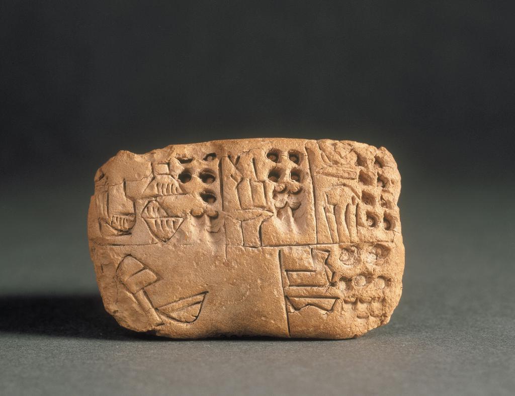 Tablet with Proto-cuneiform Inscription, late Uruk period, 3400–3100 BC, unfired clay. Musée du Louvre, Department of Near Eastern Antiquities, Paris. Purchase, 1988 (Erlenmeyer collection). Image © RMN-Grand Palais / Art Resource, NY. Photo: Franck Raux