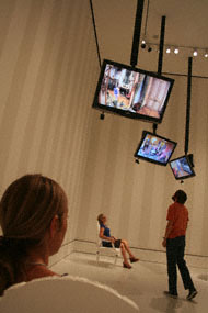 Visitors interact with Cohen's installation.