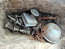 Excavation view of a hoard of metal objects at Vani