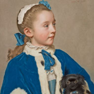 Portrait of a young blonde girl wearing a cobalt blue cape trimmed in ermine holding a small black dog under her arm.