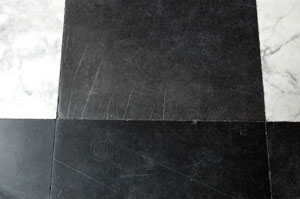 Damage to the stone floor (photo: P. Ryan)