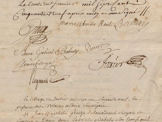 Detail of a cream-colored piece of paper showing six to seven signatures in black ink. There is text written by hand in French above and below the signatures.