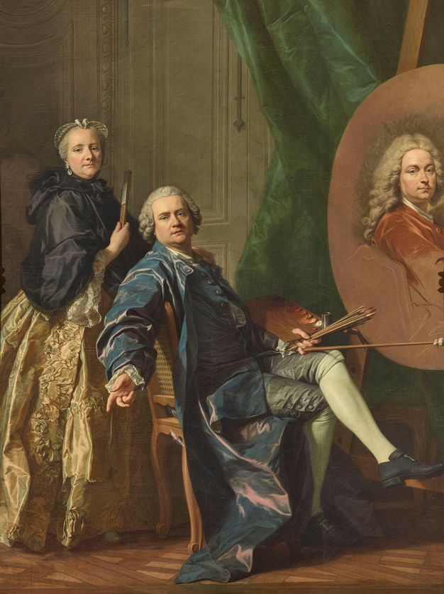 Portrait of a man and a woman next to a circular canvas with an unfinished portrait. Both the man and the individual depicted on the canvas are the same as the ones depicted in figure 140. The man here is shown sideways, sitting on a wooden chair. He wears the same matching robe and waistcoat in blue as he appears wearing in figure 140. In this case, his breeches and stockings are also visible. He holds a rectangular color palette and brushes on his left hand. Standing behind him is a woman wearing a black cape over a yellow puffy dress. She wears diamond earrings and head ornament. She holds a fan in her right hand.