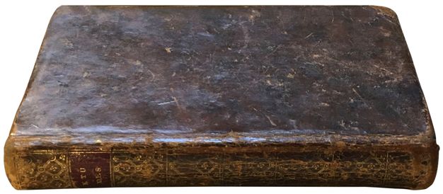 Leather-bound book with gilding details on its spine.