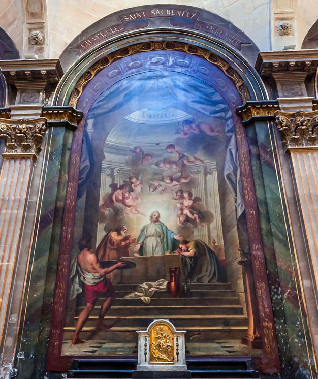 Large-scale altarpiece painting. At the bottom of the scene, a man is shown walking up a set of stairs carrying a large tray in front of his body. He walks towards an altar where Jesus can be seen framed by a person on each side. The people next to Jesus are shown in profile leaning and bowing towards him. A dozen of cherubs float above, illuminated by an oculus at the ceiling.