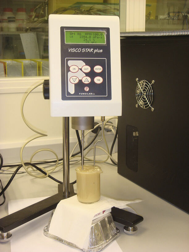 Photo of scientific measurement tools atop a grey table.