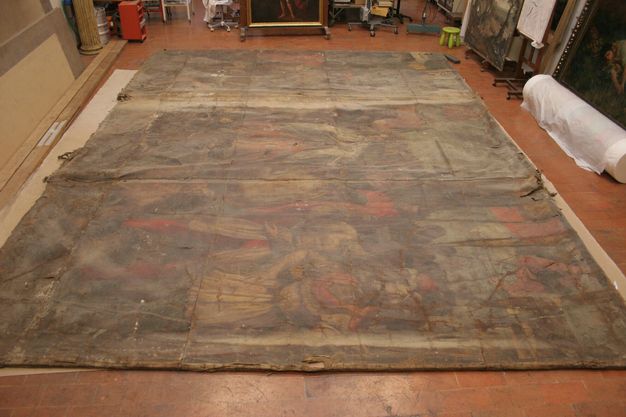 Wide photograph of a large oil painting prior to restoration. The painting is faded with washed out colors.