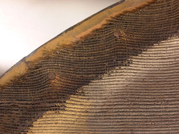 Close up photo of the canvas weaving for the painting in 13.1.