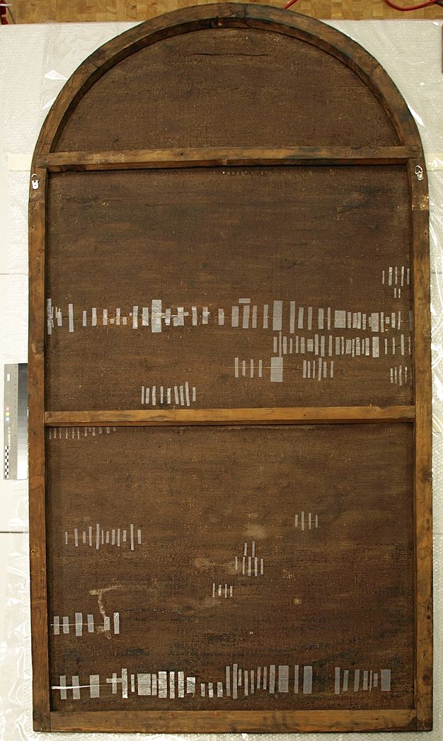 Photo of the back of the painting (13.1) with its tears repaired.