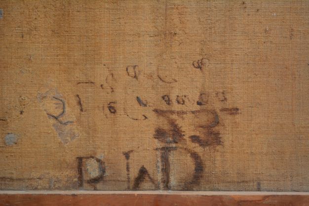 Close up photo of the same marks (26.6.a), though the canvas is now brighter and the marks/writing are clearer.