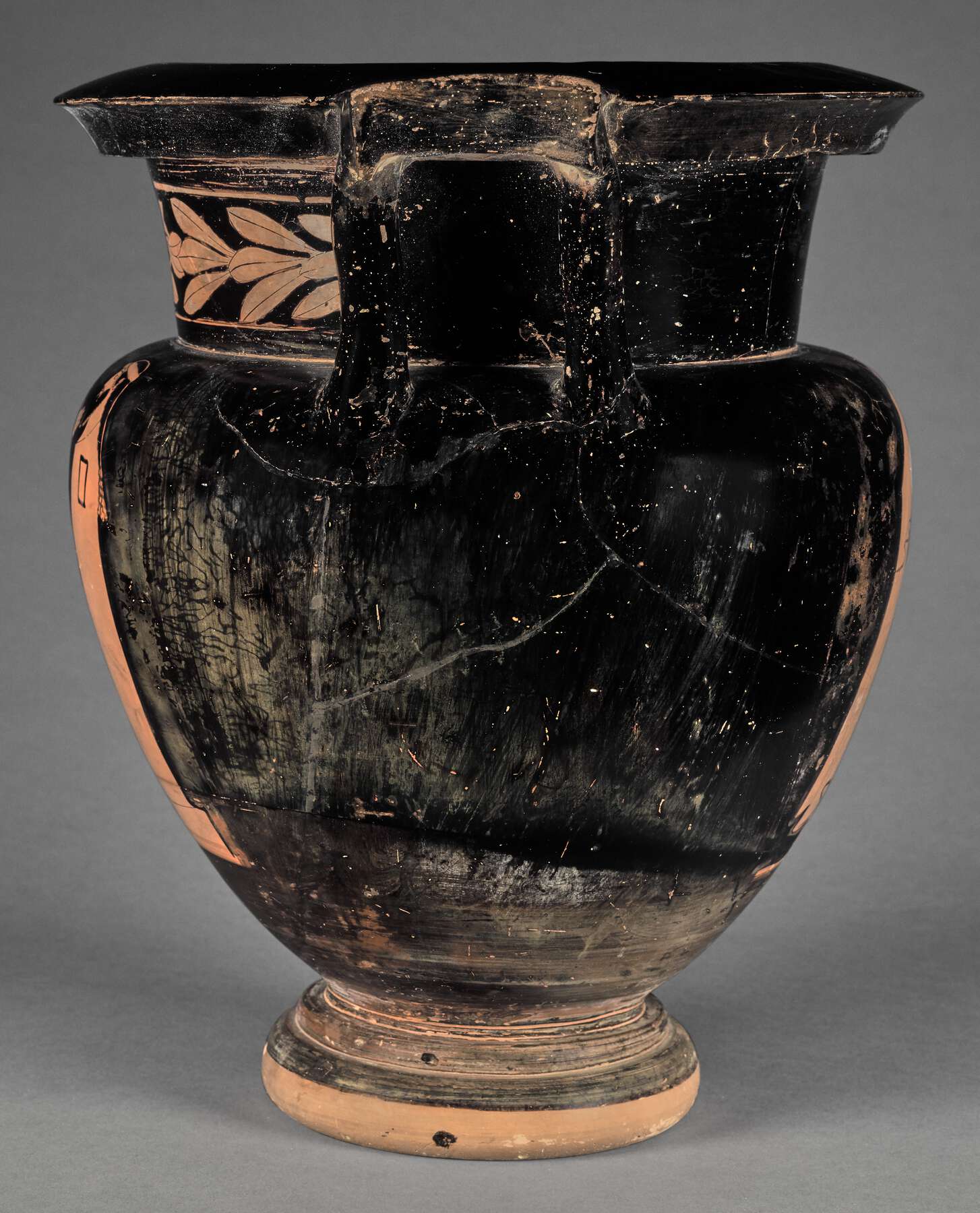 Side view of the vase, with the leaves on the left
