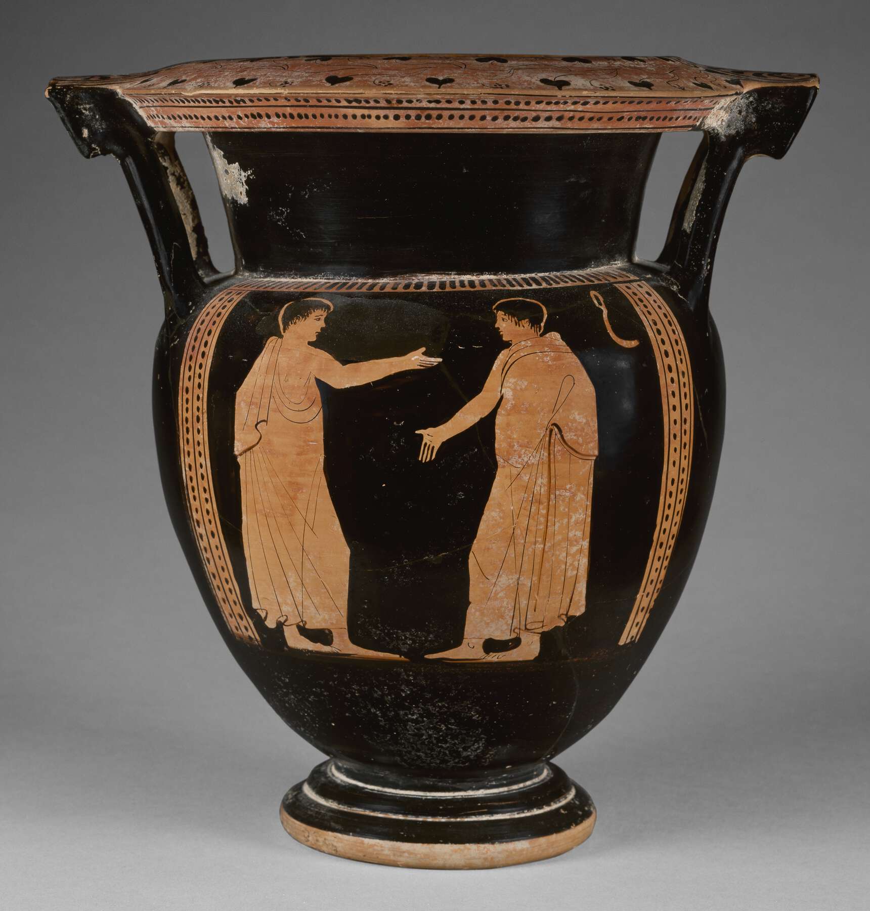 Another view of the vase, the body decoration showing two people in clothes