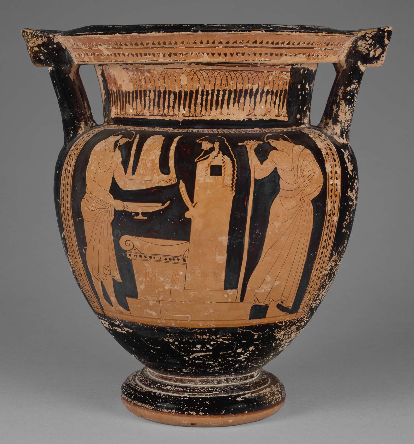 One view of a vase, the body showing three people, two of them holding things, standing next to a larger object