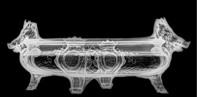 X-radiograph of the tureen, revealing the symmetric attachment of boar heads and coat of arms as ornamentation.