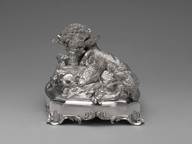 Side view of the centerpiece with an onion and bird at the dead rabbit's feet.