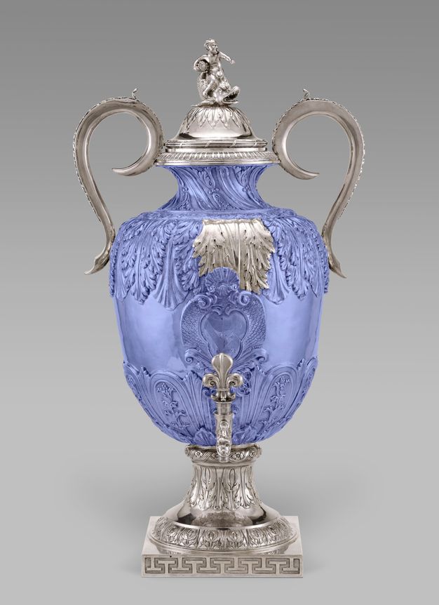 Silver fountain with the main body highlighted blue, except for two leaves in the center and the tap.