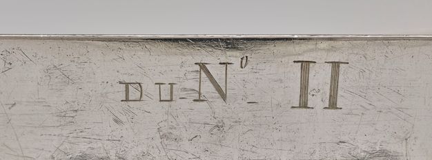 Close-up of the letters DU-N°-II stamped on the interior of the liner.