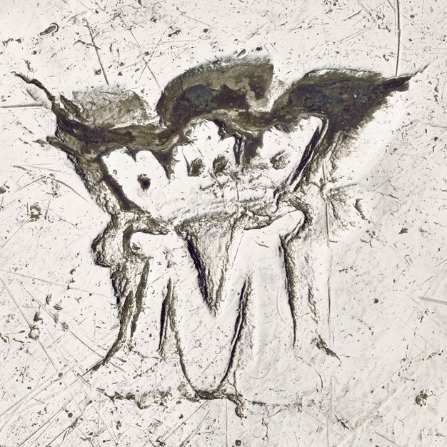 Close-up of a crowned M stamped on the liner.