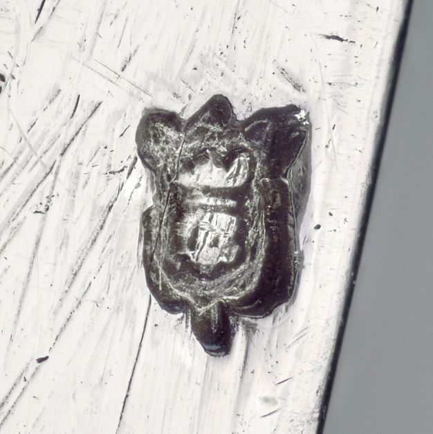 Close-up of a crowned mace attached to the liner.