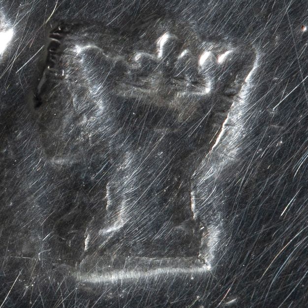 Close-up of a crowned I stamped on the tureen.