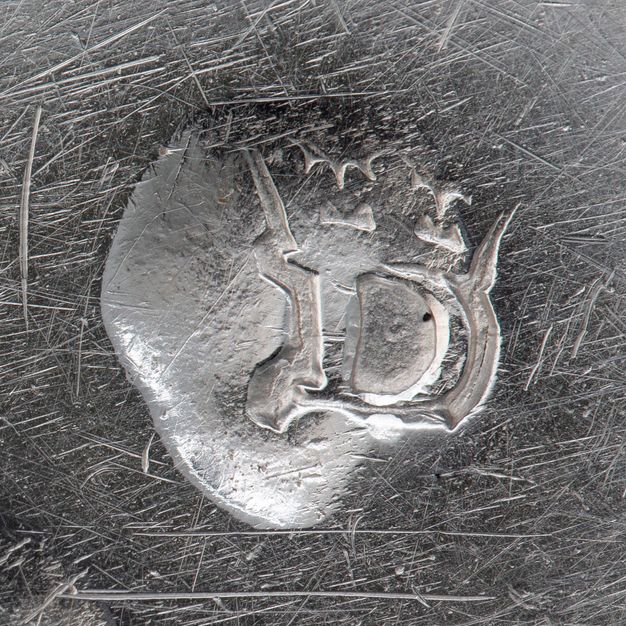 Close-up of a crowned D stamped on the liner.